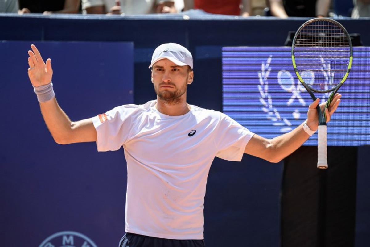 Belgium's Raphael Collignon reacts during his men's singles final match against Greece's Stefanos Tsitsipas at the Swiss Open tennis tournament in Gstaad, on July 19, 2026.  Fabrice COFFRINI / AFP