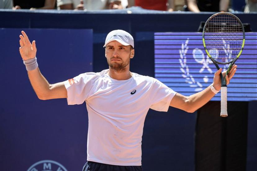 Belgium's Raphael Collignon reacts during his men's singles final match against Greece's Stefanos Tsitsipas at the Swiss Open tennis tournament in Gstaad, on July 19, 2026.  Fabrice COFFRINI / AFP