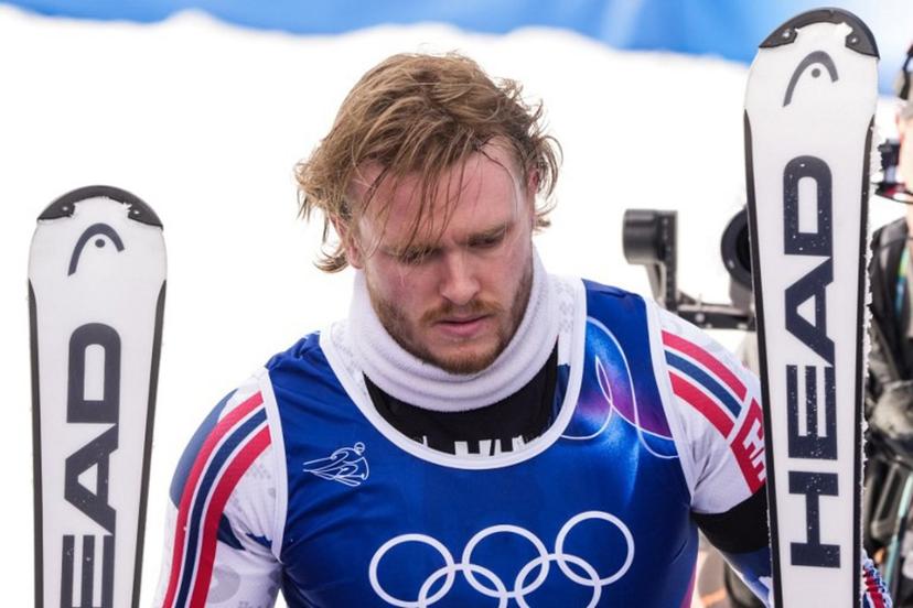 Norway's Atle Lie McGrath leaves the finish area after stradling a gate and skiing out in the second run of the men's slalom alpine skiing event during the Milano Cortina 2026 Winter Olympic Games at the Stelvio Ski Centre in Bormio (Valtellina) on February 16, 2026.  Dimitar DILKOFF / AFP