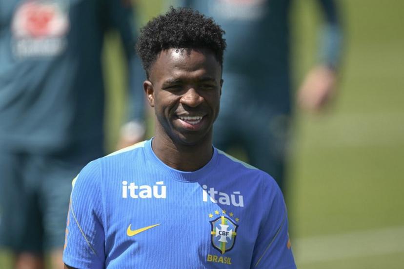 Brazil's forward Vinicius Junior smiles on during a training session as part of the team's preparation for its FIFA World Cup football tournament opening match against Morocco at Columbia Park Training Facility in Morristown, New Jersey on June 9, 2026.  MAURO PIMENTEL / AFP