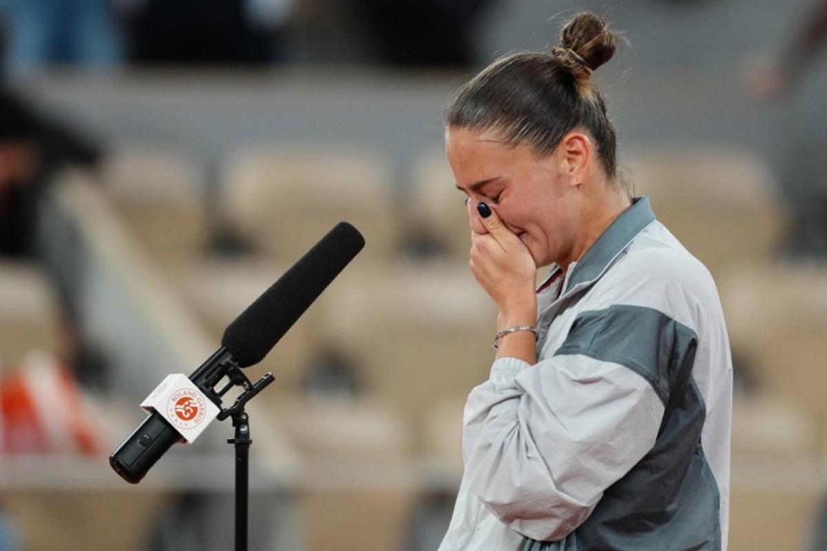 Ukraine's Marta Kostyuk reacts to her victory at the end of her women's quarter final singles match against Ukraine's Elina Svitolina on day 10 of the French Open tennis tournament on Court Philippe-Chatrier at the Roland-Garros Complex in Paris on June 2, 2026.  Dimitar DILKOFF / AFP