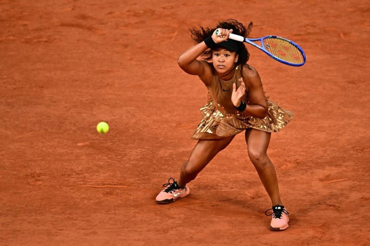 Japan's Naomi Osaka plays a forehand return to Aryna Sabalenka during their women's singles match on day 9 of the French Open tennis tournament on Court Philippe-Chatrier at the Roland-Garros Complex in Paris on June 1, 2026.  JULIEN DE ROSA / AFP