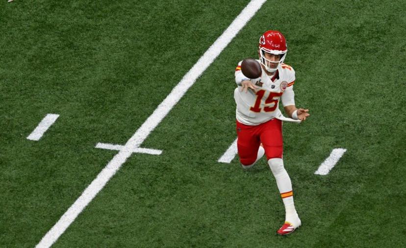 Kansas City Chiefs' quarterback #15 Patrick Mahomes throws the ball during Super Bowl LIX between the Kansas City Chiefs and the Philadelphia Eagles at Caesars Superdome in New Orleans, Louisiana, February 9, 2025.  Chandan Khanna / AFP