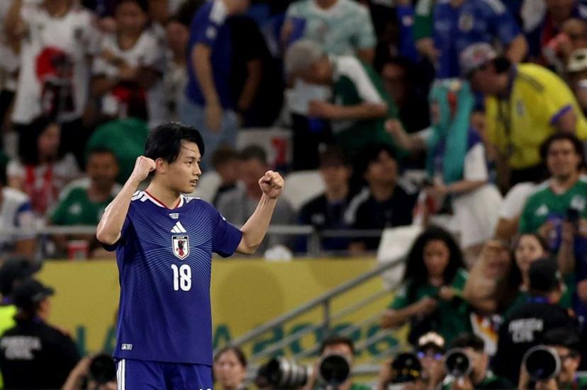 Japan's forward #18 Ayase Ueda celebrates after scoring his team second goal during the 2026 World Cup Group F football match between Tunisia and Japan at the Monterrey Stadium in Guadalupe, Mexico, on June 20, 2026.   Julio Cesar AGUILAR / AFP