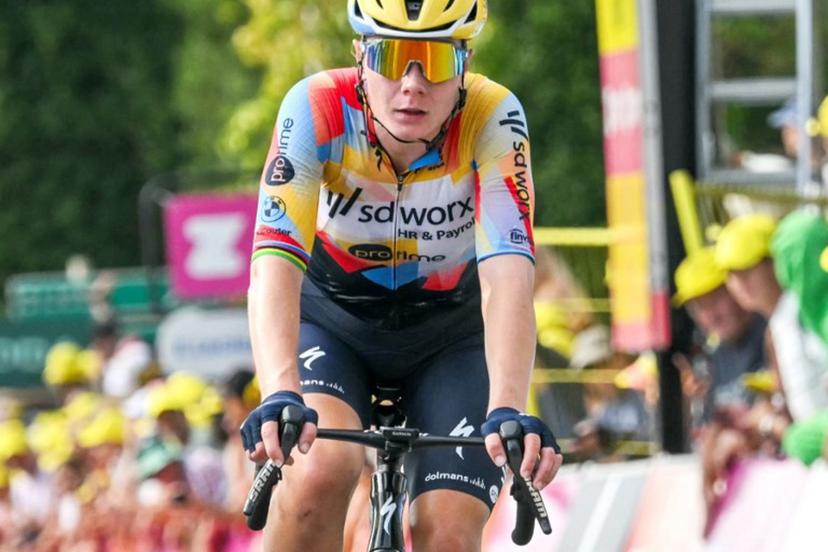 Team SD Worx-Protime's Belgian rider Lotte Kopecky crosses the finish line to finish in second-placed in the 3rd (out of 9) stage of the fifth edition of the Women's Tour de France cycling race, 156.5 km from Geneva to Poligny, in Poligny, central-eastern France on August 3, 2026.  NICOLAS TUCAT / AFP