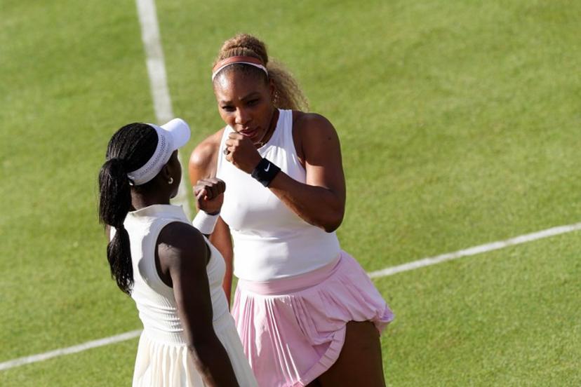 US player Serena Williams (R) strategizes with Canada's Victoria Mboko (L) during their match against US player Nicole Melichar-Martinez and New Zealand's Erin Routliffe during their round of 16, doubles match at the HSBC WTA tennis Championships at Queen's Club in west London on June 9, 2026.  Adrian Dennis / AFP