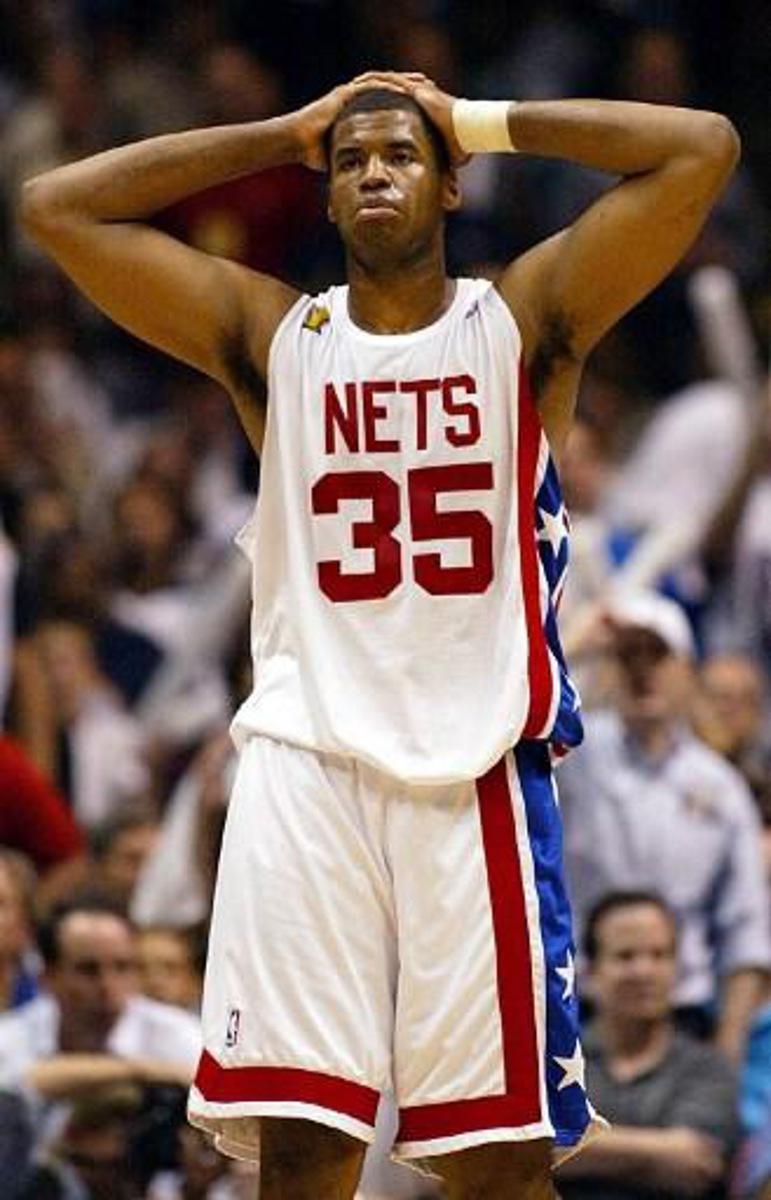 New Jersey Net Jason Collins reacts to a foul call in the second half during game 5 against the San Antonio Spurs 13 June, 2003 during the NBA Finals  in East Rutherford, NJ. The Spurs won the game 93-83 to take a 3-2 lead in the series.  AFP PHOTO Don EMMERT