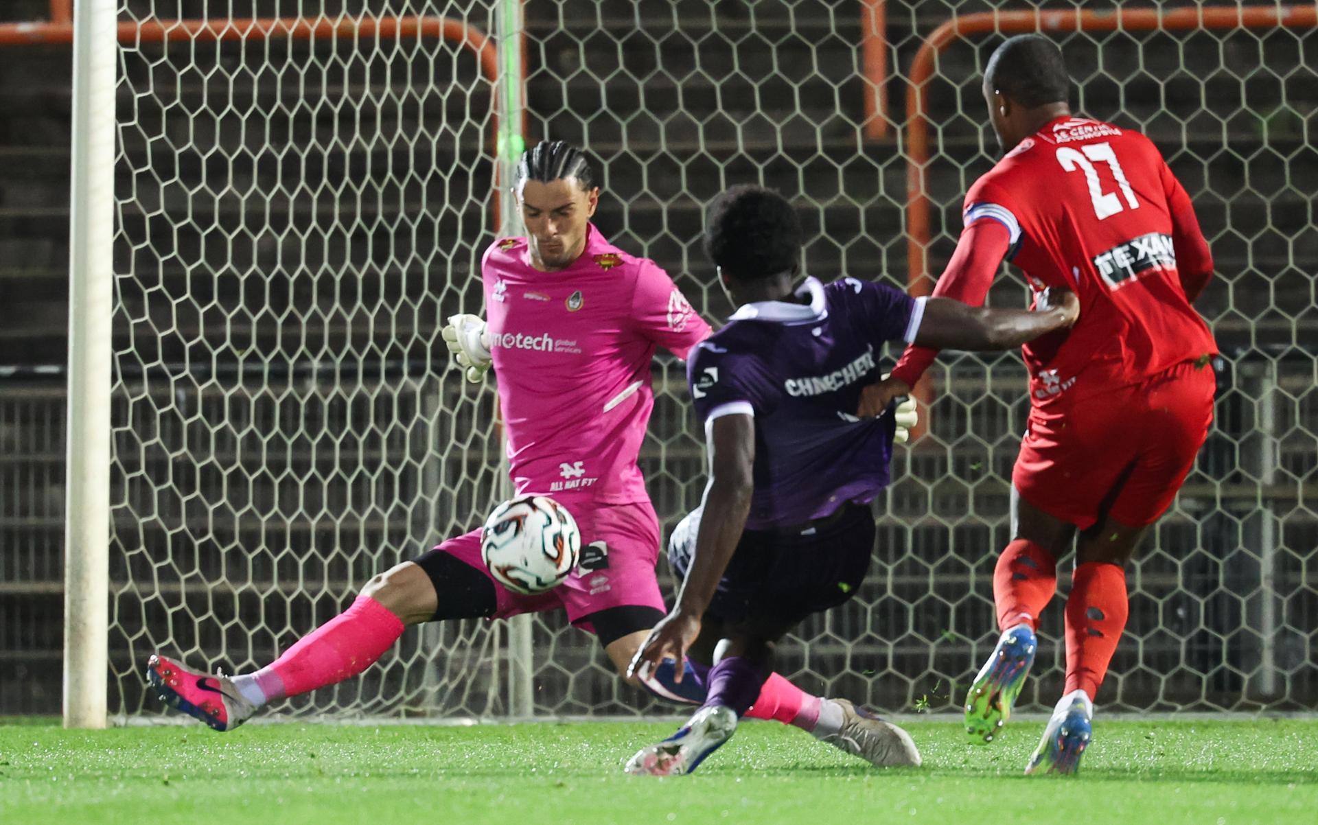 Olympic's goalkeeper Aitor Embela fights for the ball during a soccer game between RSCA Futures and Royal Olympic Charleroi, on Friday 17 April 2026 in Deinze, on day 34 of the 2025-2026 'Challenger Pro League' 1B second division of the Belgian championship. BELGA PHOTO VIRGINIE LEFOUR