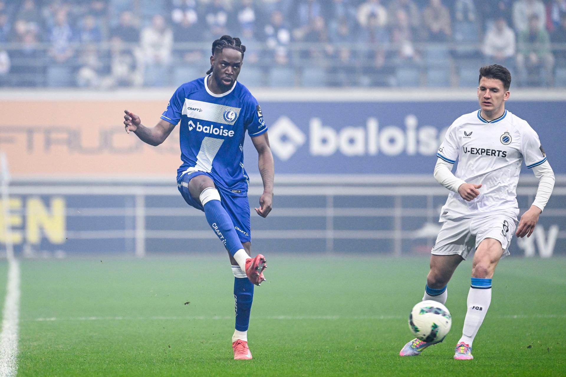 Gent's Jordan Torunarigha and Club's Christos Tzolis pictured in action during a soccer match between KAA Gent and Club Brugge, Sunday 20 April 2025 in Gent, on day 4 (out of 10) of the Champions' Play-offs of the 2024-2025 'Jupiler Pro League' first division of the Belgian championship. BELGA PHOTO TOM GOYVAERTS