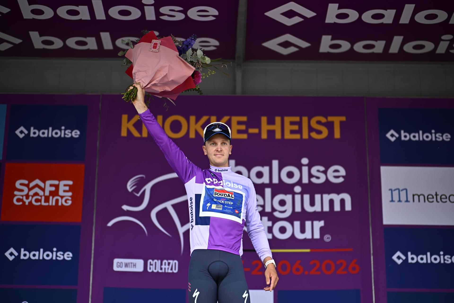 Belgian Tim Merlier of Soudal Quick-Step celebrates on the podium after winning stage 2 of the Baloise Belgium Tour cycling race, 197,6 km from Merelbeke-Melle to Knokke-Heist, Thursday 18 June 2026. The Baloise Belgium Tour takes place from 17 to 21 June. BELGA PHOTO JASPER JACOBS