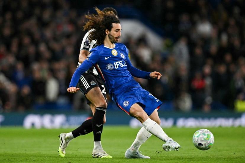 Chelsea's Spanish defender #03 Marc Cucurella passes the ball during the English Premier League football match between Chelsea and Newcastle United at Stamford Bridge in London on March 14, 2026.  Glyn KIRK / AFP