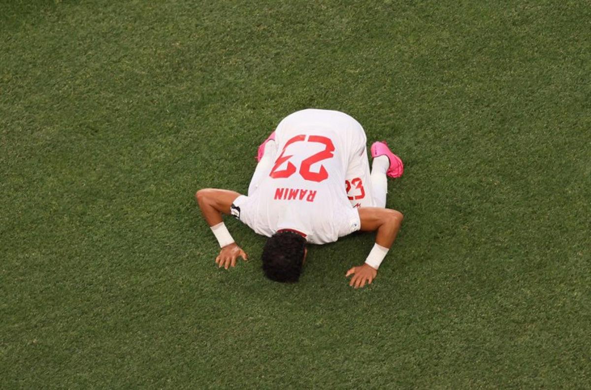 Iran's defender #23 Ramin Rezaeian celebrates scoring his team's first goal during the 2026 World Cup Group G football match between Iran and New Zealand at Los Angeles Stadium in Inglewood on June 15, 2026.   Etienne Laurent / AFP