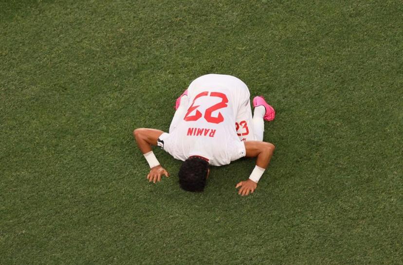 Iran's defender #23 Ramin Rezaeian celebrates scoring his team's first goal during the 2026 World Cup Group G football match between Iran and New Zealand at Los Angeles Stadium in Inglewood on June 15, 2026.   Etienne Laurent / AFP