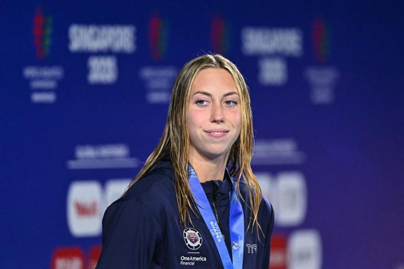 Gold medallist US' swimmer Gretchen Walsh celebrates on the podium of the women's 50m butterfly swimming event during the 2025 World Aquatics Championships in Singapore on August 2, 2025.  MANAN VATSYAYANA / AFP