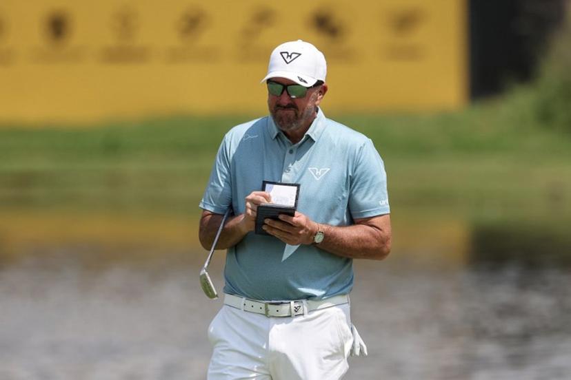 Hyflyers GC's US player Phil Mickelson reacts after putting on the 12th green on the first day of the LIV Golf South Africa tournament at The Club in Steyn City on March 19, 2026.  PHILL MAGAKOE / AFP
