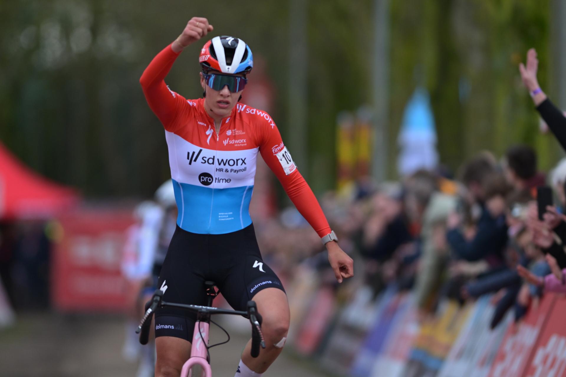 Luxembourgian Marie Schreiber celebrates as he crosses the finish line to win the women's elite race of the 'Parkcross' cyclocross cycling event, race 6/7 in the 'Exact Cross' competition, Wednesday 04 February 2026 in Maldegem. BELGA PHOTO DAVID PINTENS
