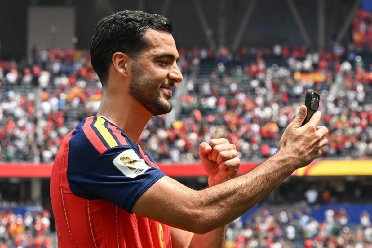 Spain's midfielder #06 Mikel Merino celebrates after winning the 2026 World Cup football tournament quarter-final match between Spain and Belgium at the Los Angeles Stadium in Inglewood on July 10, 2026.   Paul ELLIS / AFP