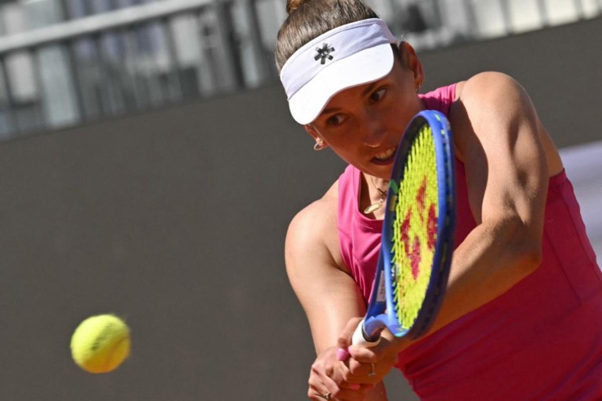 Belgium's Elise Mertens hits a return to Russia's Mira Andreeva during the WTA Rome Open tennis tournament at Foro Italico in Rome on May 11, 2026.   Andreas SOLARO / AFP
