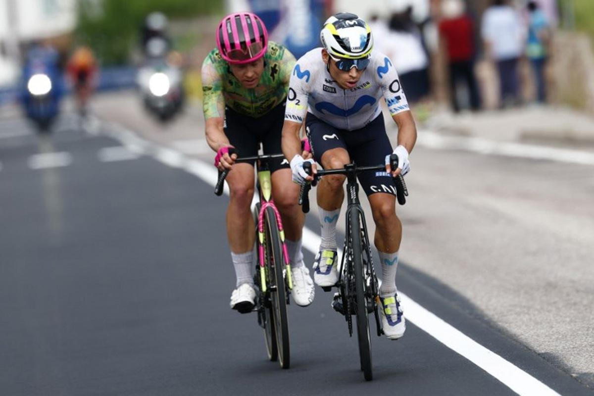 Movistar Team Colombian rider Einer Rubio (R) and EF Education - EasyPost Danish rider Michael Valgren ride at the front of the race during the 17th stage of the Giro d'Italia 2026 - Tour of Italy cycling race between Cassano d'Adda and Andalo, Italy, on May 27, 2026.  Luca Bettini / AFP