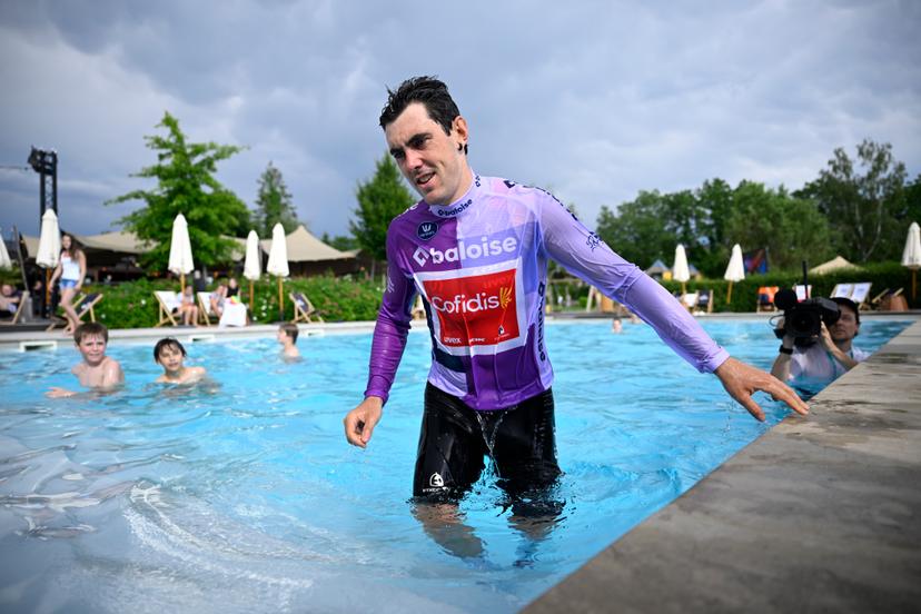Spanish Alex Aranburu of Cofidis jumps into the pool after winning stage 3 of the Baloise Belgium Tour cycling race, 173km from and to Durbuy, on Friday 19 June 2026. The Baloise Belgium Tour takes place from 17 to 21 June. BELGA PHOTO JASPER JACOBS