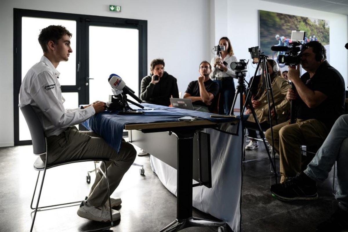 Decathlon CMA-CGM team's French rider Paul Seixas delivers remarks to journalists during a press conference at team's performance headquarters in La Motte-Servolex, central-eastern France, on May 6, 2026. French teenage prodigy Paul Seixas announced on May 4 that he will ride the Tour de France in July for the first time, raising hopes of a first home winner in more than four decades. JEFF PACHOUD / AFP