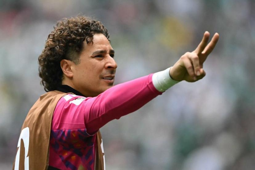 Mexico's goalkeeper #13 Guillermo Ochoa gestures during the warm-up ahead of the 2026 World Cup Group A football match between Mexico and South Africa at the Mexico City Stadium in Mexico City on June 11, 2026.  CARL DE SOUZA / AFP