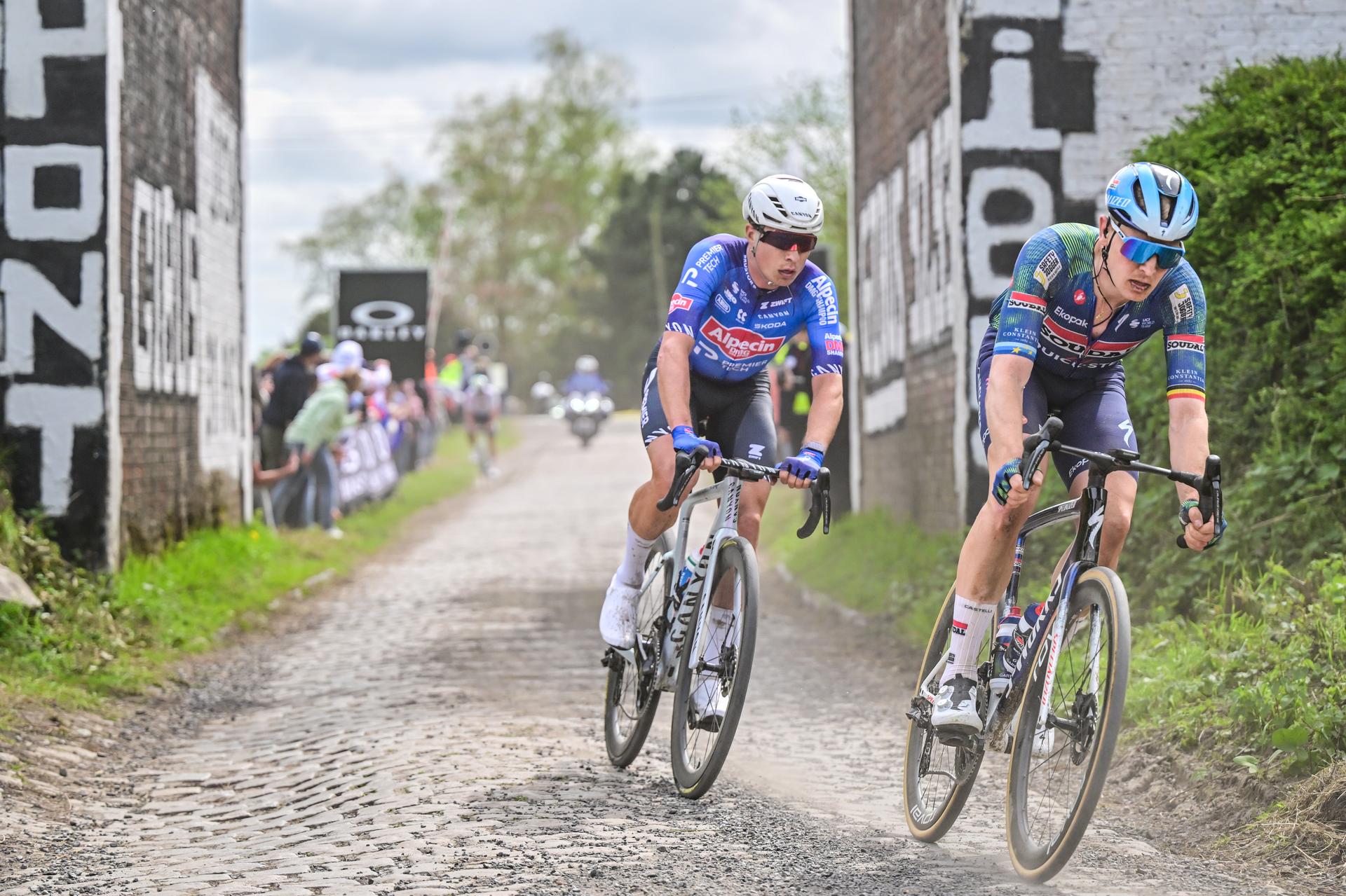Belgian Jasper Philipsen of Alpecin-Premier Tech and Belgian Tim Merlier of Soudal Quick-Step pictured in action during the men's Paris-Roubaix cycling race, Sunday 12 April 2026, around Roubaix, France. The 123rd edition of Paris-Roubaix cycling races will take on Sunday, with the women riding 143,1 km the men riding 258,3 km on Sunday. BELGA PHOTO DIRK WAEM