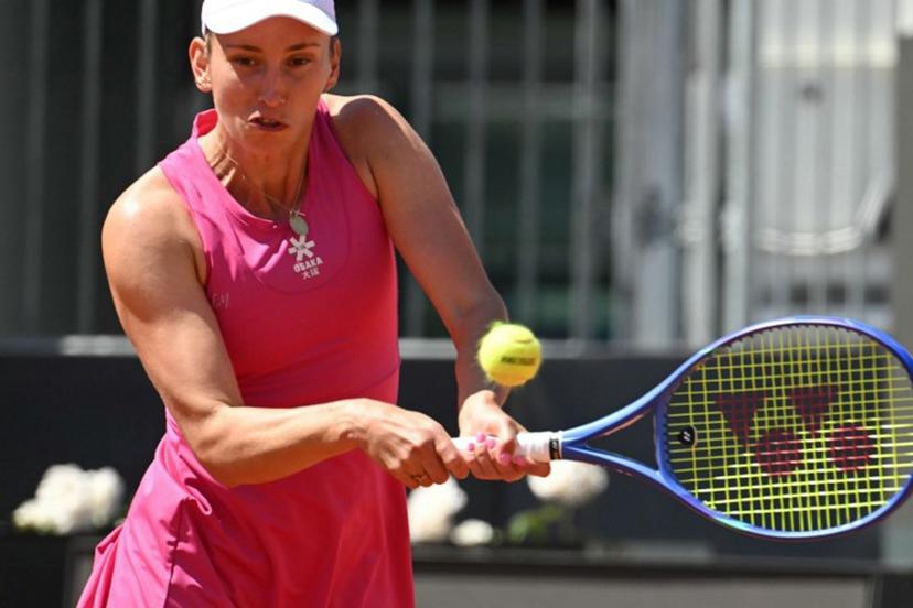 Belgium's Elise Mertens hits a return to Russia's Mira Andreeva during the WTA Rome Open tennis tournament at Foro Italico in Rome on May 11, 2026.   Andreas SOLARO / AFP