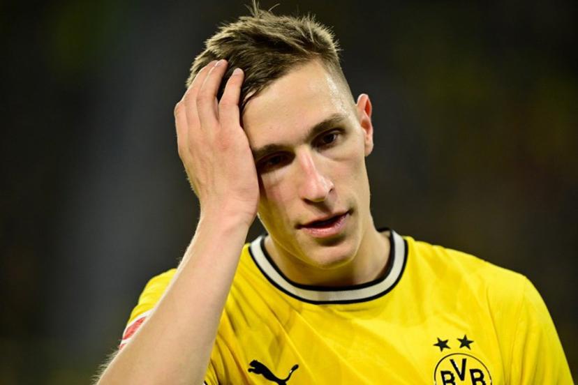 Dortmund's German defender #04 Nico Schlotterbeck reacts during the German first division Bundesliga football match between BVB Borussia Dortmund and Eintracht Frankfurt in Dortmund, western Germany on May 8, 2026.  Ina FASSBENDER / AFP