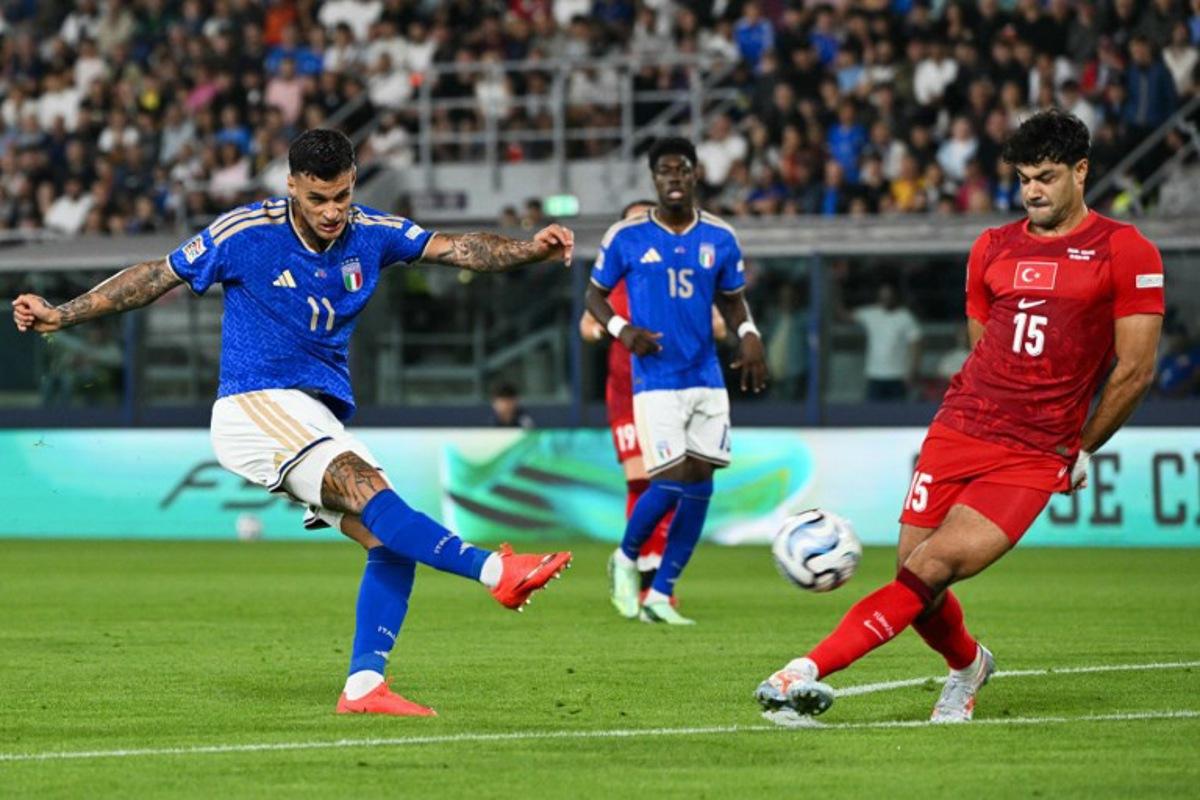 Italy's forward #11 Gianluca Scamacca shoots and tries to score during the UEFA Nations League football match (League A day 4, Group A1) between Italy and Turkey at the Renato Dall'Ara Stadium in Bologna on October 5, 2026.  Alberto PIZZOLI / AFP