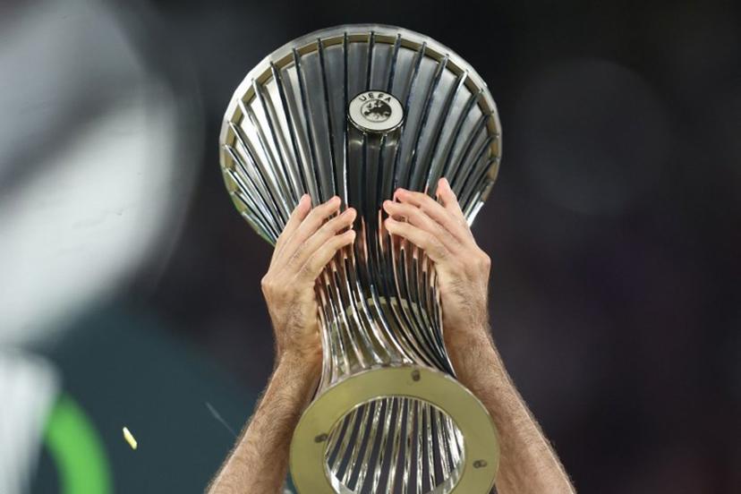 The trophy is lifted after the end of the UEFA Conference League final football match between Crystal Palace FC and Rayo Vallecano de Madrid in Leipzig, eastern Germany, on May 27, 2026.    Ronny HARTMANN / AFP