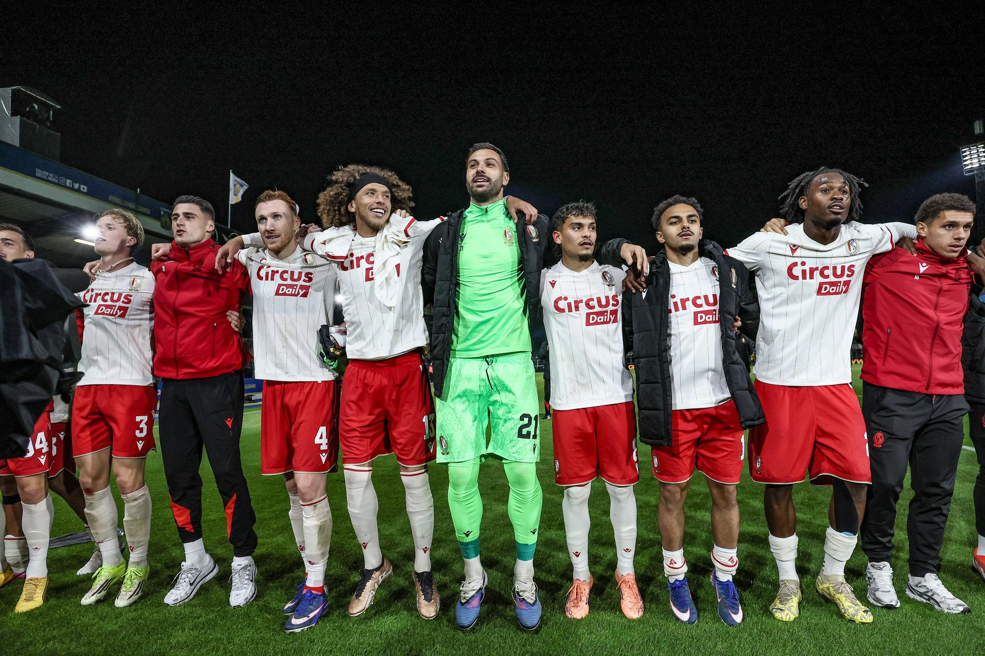 Standard's players celebrate after winning a soccer match between KVC Westerlo and Standard de Liege, Tuesday 19 May 2026 in Westerlo, on the ninth day of the Europe Play-offs (PO2) of the 2025-2026 'Jupiler Pro League' first division of the Belgian championship. BELGA PHOTO BRUNO FAHY