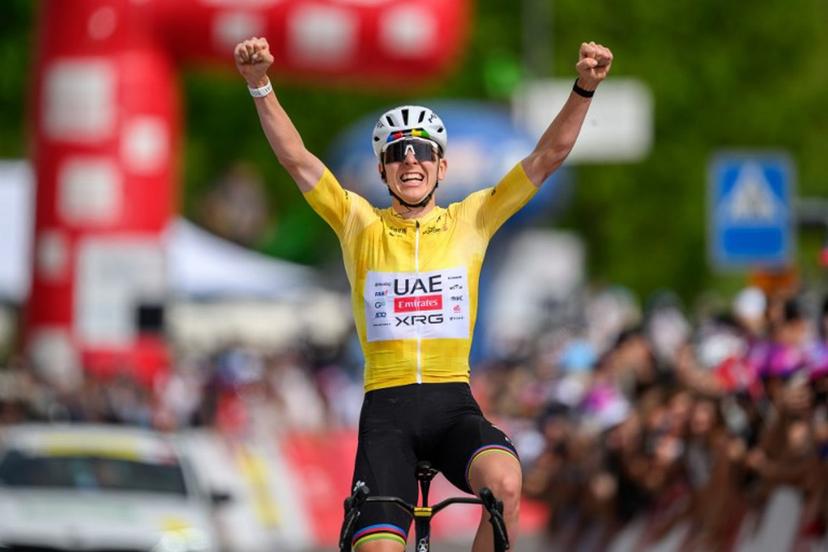 UAE Team Emirates-XRG's Slovenian rider Tadej Pogacar celebrates as he crosses the finish line wining the fourth stage of the Tour of Romandie UCI cycling World tour, 149.6 km from Broc and to Charmey, in Charmey, Switzerland, on May, 2, 2026.  Fabrice COFFRINI / AFP