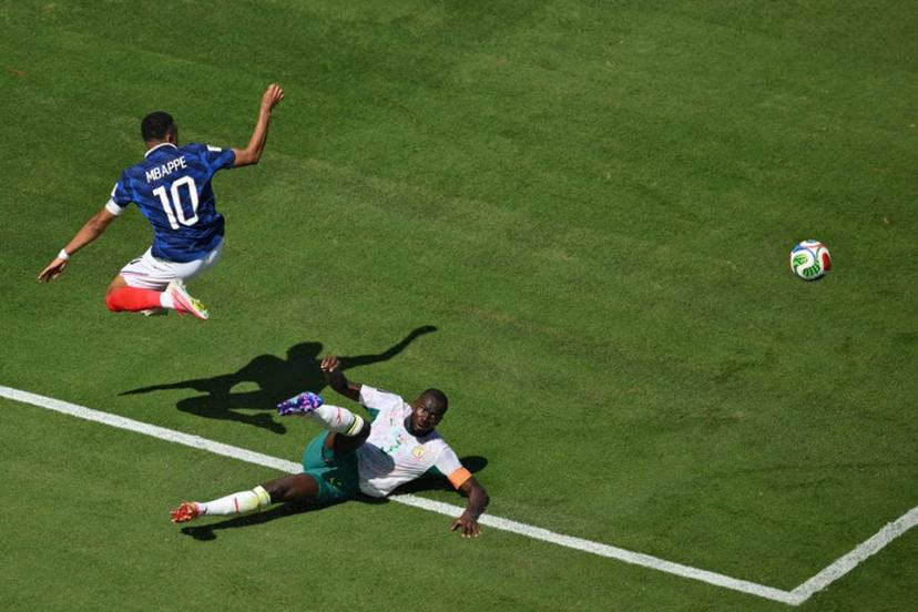 France's forward #10 Kylian Mbappe and Senegal's defender #03 Kalidou Koulibaly fight for the ball during of the 2026 World Cup Group I football match between France and Senegal at the New York/New Jersey Stadium in East Rutherford on June 16, 2026.  Angela WEISS / AFP