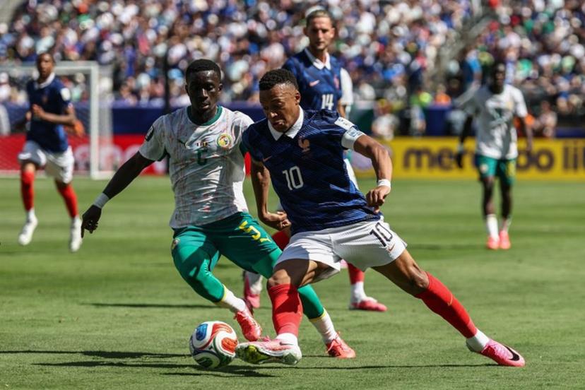 France's forward #10 Kylian Mbappe and Senegal's midfielder #05 Idrissa Gana Gueye fight for the ball during the 2026 World Cup Group I football match between France and Senegal at the New York/New Jersey Stadium in East Rutherford on June 16, 2026.   FRANCK FIFE / AFP