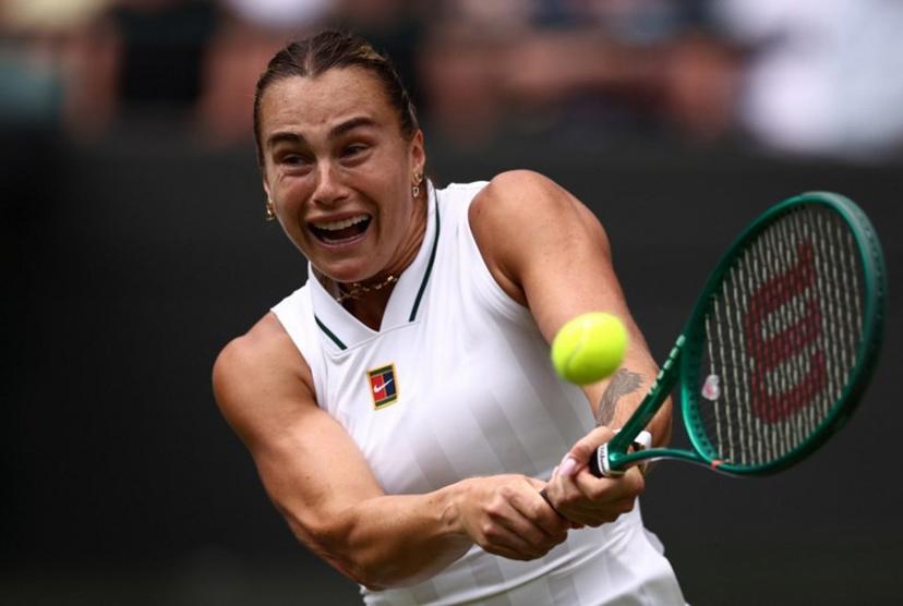Belarus's Aryna Sabalenka returns to US player McCartney Kessler during their women's singles second round tennis match on the third day of the 2026 Wimbledon Championships at The All England Lawn Tennis and Croquet Club in Wimbledon, southwest London, on July 1, 2026.  HENRY NICHOLLS / AFP