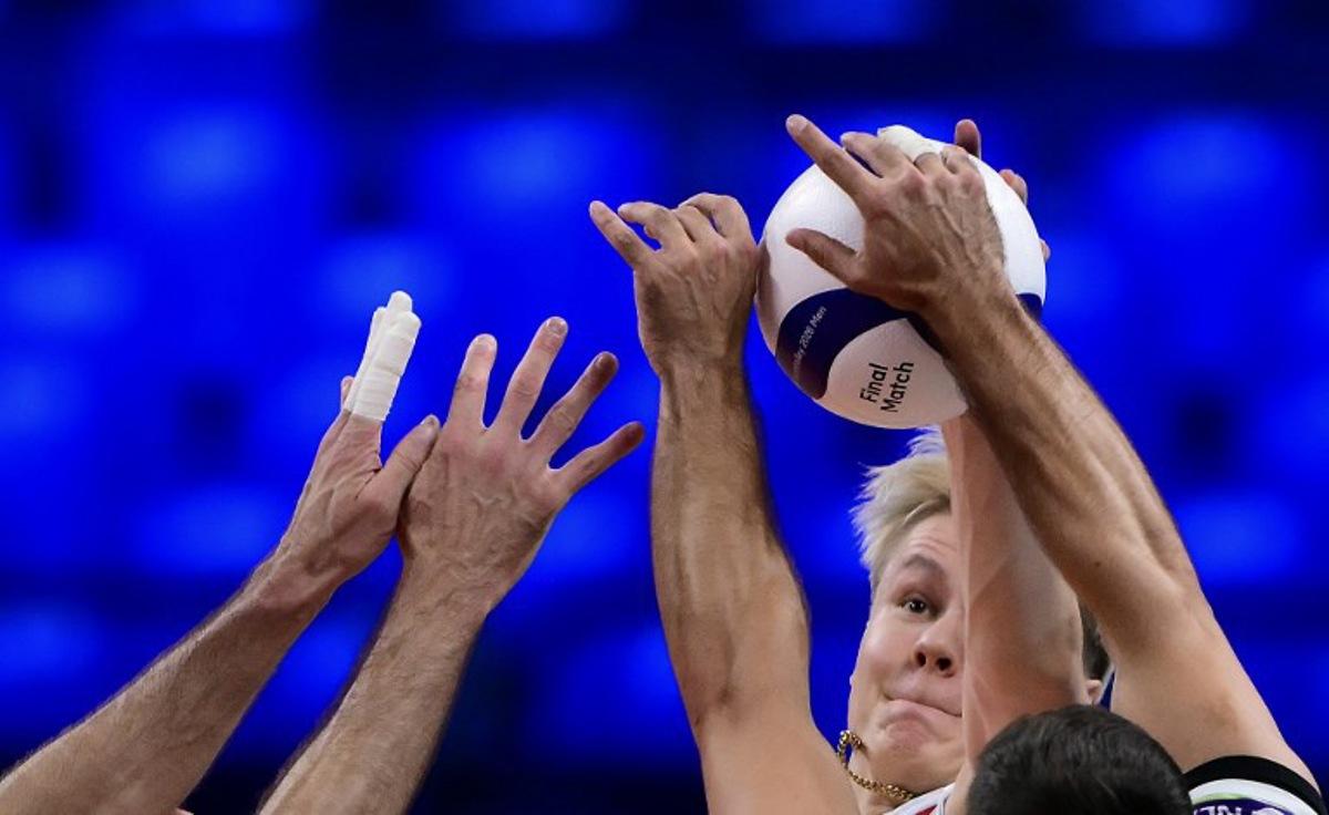 Finland's Opposite Hitter #10 Luka Marttila spikes the ball during the CEV EuroVolley 2026 men's bronze medal volleyball match final between Finland and Slovenia at the Forum of Assago, on September 26, 2026.  Marco BERTORELLO / AFP