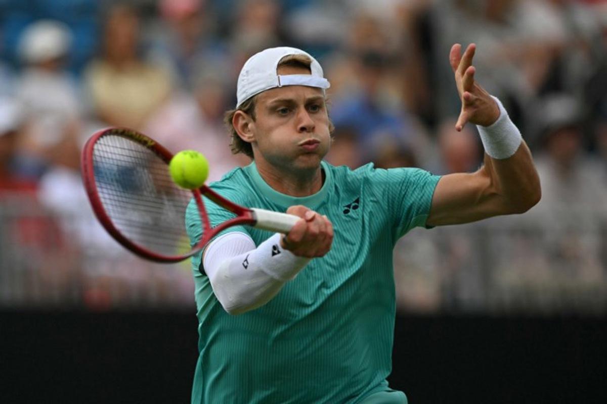 Belgium's Zizou Bergs returns to France's Ugo Humbert during their men's final tennis match on day six of the Lexus Eastbourne Open at Devonshire Park, Eastbourne, on the south coast of England on June 27, 2026.  Glyn KIRK / AFP