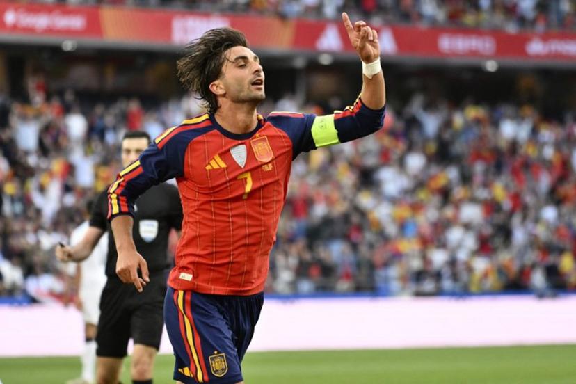 Spain's forward #07 Ferran Torres celebrates scoring the opening goal during the international friendly football match between Spain and Iraq ahead of the 2026 FIFA World Cup football tournament, at the Riazor stadium in A Coruna, northern Spain, on June 4, 2026.  Ander Gillenea / AFP