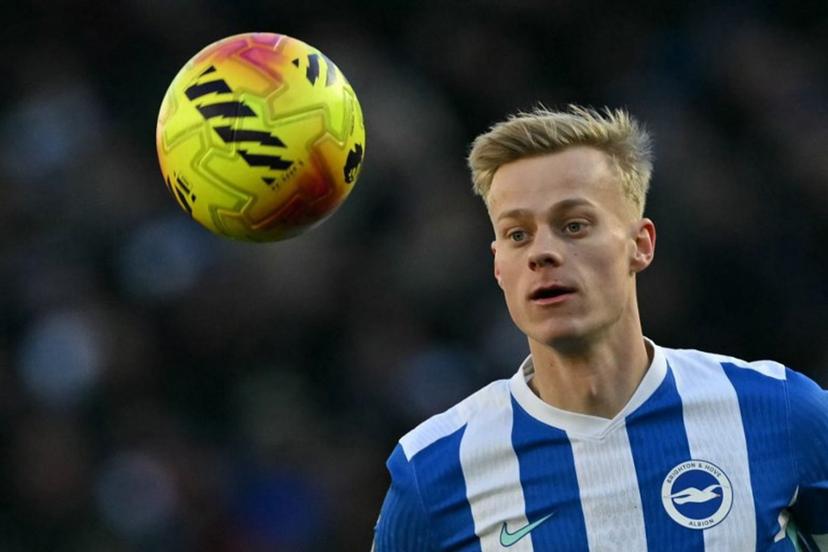 Brighton's Dutch defender #06 Jan Paul van Hecke eyes the ball during the English Premier League football match between Brighton and Hove Albion and Burnley at the American Express Community Stadium in Brighton, southern England on January 3, 2026.  Glyn KIRK / AFP