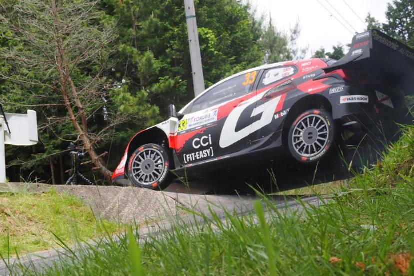 Elfyn Evans of Britain and his co-driver Scott Martin of Britain drive their Toyota GR Yaris Rally1 during the SS19 Nukata section of the Rally Japan, the 7th round of FIA World Rally Championships, in Shinshiro city, Aichi prefecture on May 31, 2026.  Toshifumi KITAMURA / AFP
