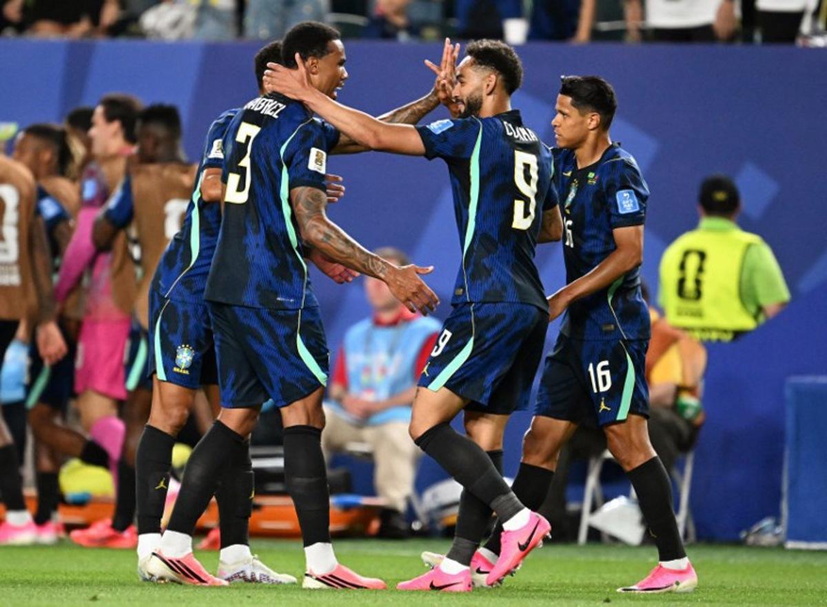 Brazil's forward #09 Matheus Cunha celebrates scoring his team's second goal with teammates during the 2026 World Cup Group C football match between Brazil and Haiti at the Philadelphia Stadium in Philadelphia on June 19, 2026.   ROBERTO SCHMIDT / AFP