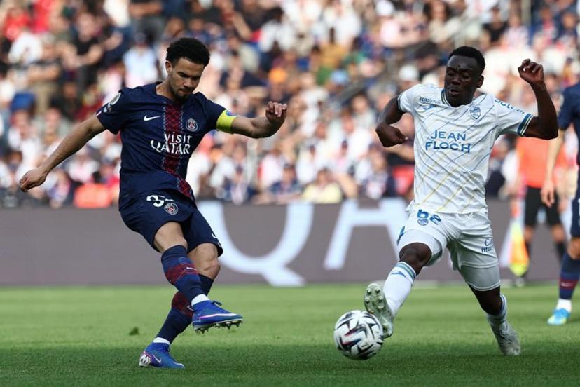 Paris Saint-Germain's French midfielder #33 Warren Zaïre-Emery (L) scores his side's second goal during the French L1 football match between Paris Saint-Germain (PSG) and FC Lorient at Parc des Princes stadium in Paris on May 2, 2026.  FRANCK FIFE / AFP