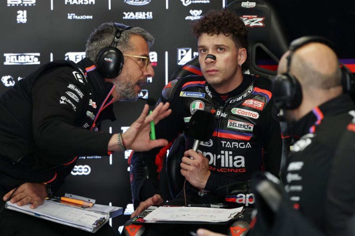 Team Aprilia Racing's Marco Bezzecchi is seen in the box during the second free practice session at the Catalunya Moto GP Grand Prix at the Catalunya racetrack in Montmelo, near Barcelona, on May 16, 2026.  Lluis GENE / AFP