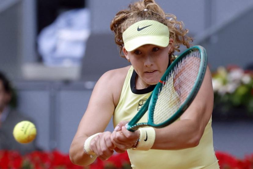 Russia's Mirra Andreeva returns a ball to Ukraine's Marta Kostyuk during the 2026 WTA Tour Madrid Open tennis tournament final singles match at the Caja Magica in Madrid, on May 2, 2026.  Oscar DEL POZO / AFP