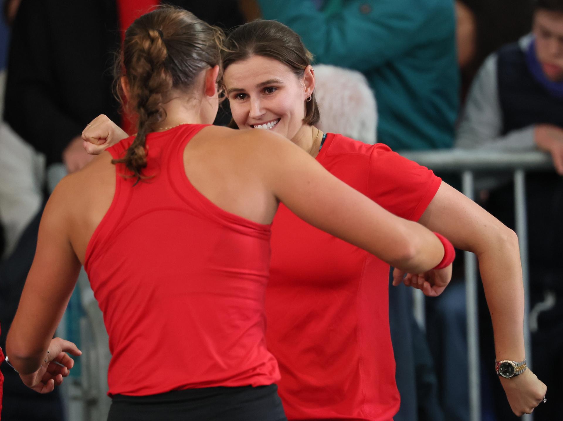 Belgian Hanne Vandewinkel and Belgian Greet Minnen celebrate after the second game between Belgian Vandewinkel and Turkish Sonmez in the Billie Jean King Cup Play-offs, between Belgium and Turkey, on Saturday 15 November 2025 in Ismaning, Germany. PHOTO BENOIT DOPPAGNE