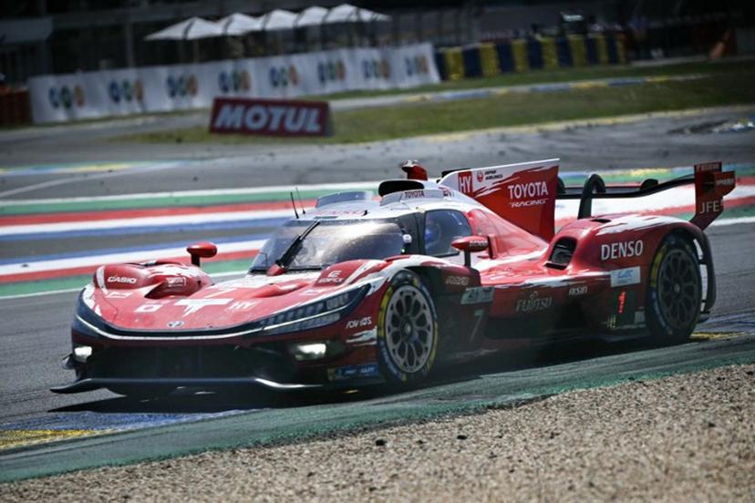 The Toyota Racing's car of British driver Mike Conway, Japanese driver Kamui Kobayashi and Dutch driver Nyck de Vriestakes a corner during the 94th edition of the 24 Hours of Le Mans at the Le Mans circuit, north-western France, on June 14, 2026.  Lou BENOIST / AFP
