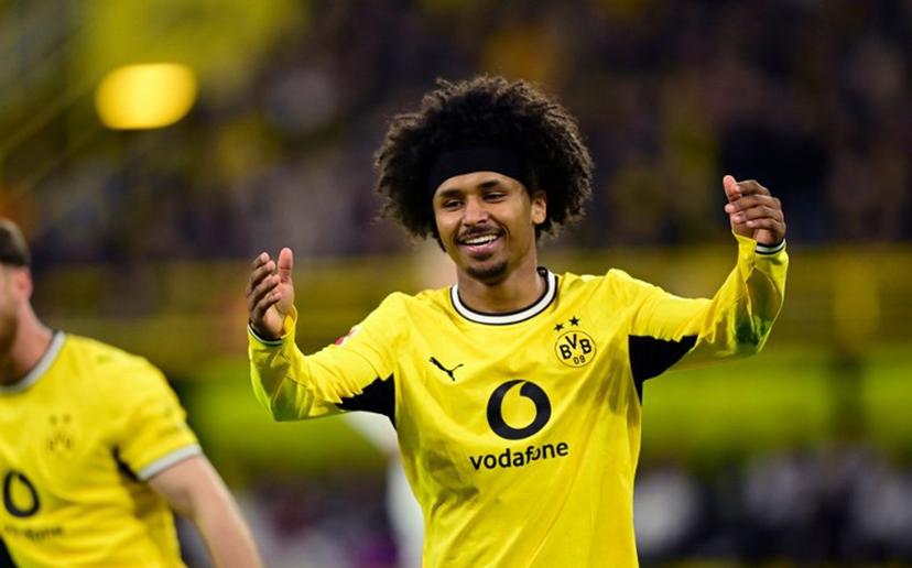 Dortmund's German forward #27 Karim Adeyemi reacts during the German first division Bundesliga football match between BVB Borussia Dortmund and Eintracht Frankfurt in Dortmund, western Germany on May 8, 2026.  Ina FASSBENDER / AFP