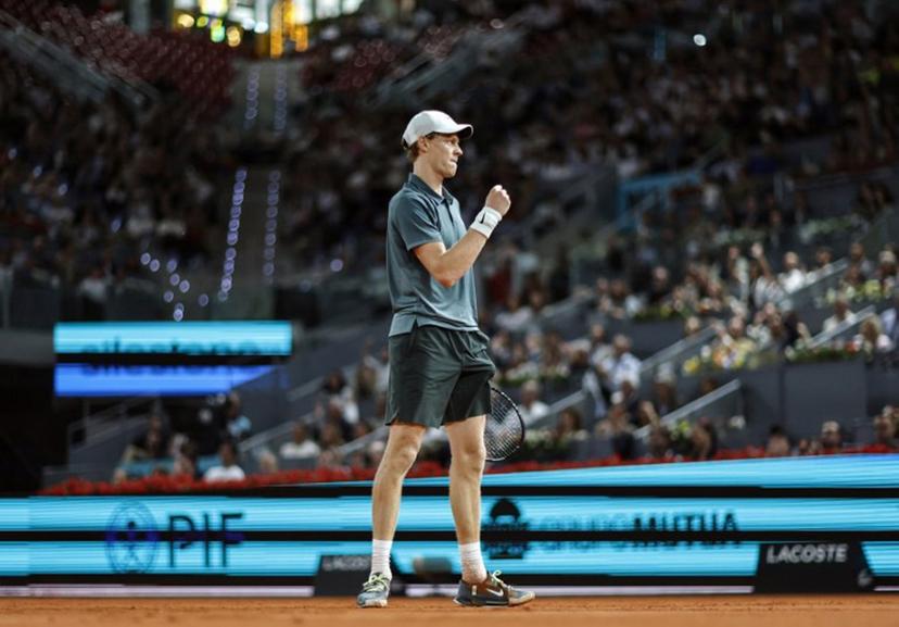 Italy's Jannik Sinner celebrates winning a game against Spain's Rafael Jodar during their 2026 ATP Tour Madrid Open tennis tournament quarterfinal singles match at the Caja Magica in Madrid, on April 29, 2026.  OSCAR DEL POZO / AFP