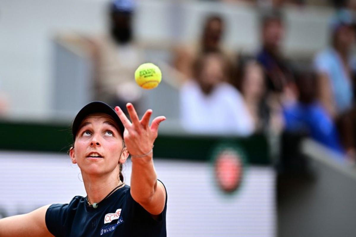Germany's Tamara Korpatsch serves to Ukraine's Elina Svitolina during their women's singles match on day 6 of the French Open tennis tournament on Court Suzanne-Lenglen at the Roland-Garros Complex in Paris on May 29, 2026.  JULIEN DE ROSA / AFP